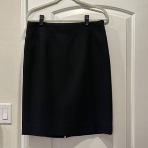 J Crew black wool pencil skirt size 10. Fully lined.